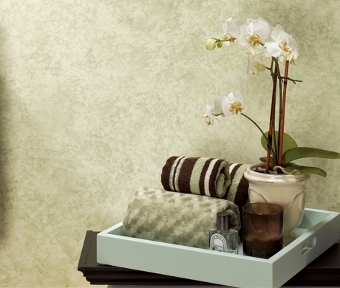 Bathroom caddy with towels, candle and oil